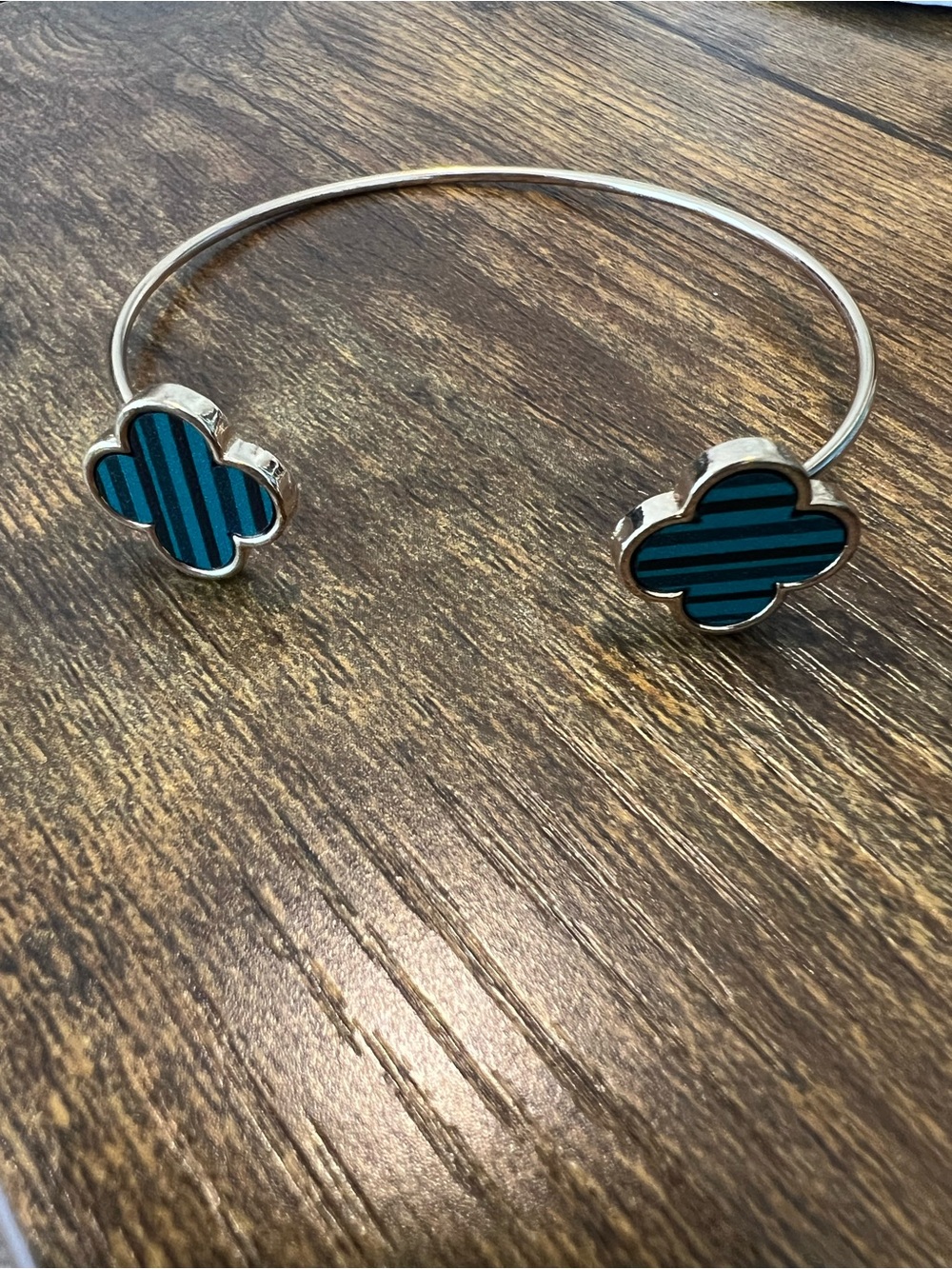 Silver Open Bangle Bracelet with Blue Striped Clover Accents